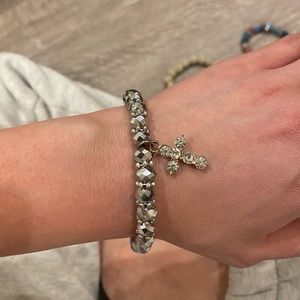 Shiny gunmetal cross bracelet